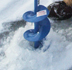 ice auger drilling through ice